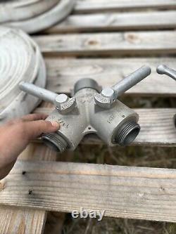 (1) 1 1/2 Fire Hose (3) 1 Fire Hose, 2 Forester Nozzles, Reducers & Gated Wyes