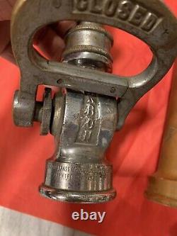 2 vintage fire hose Water nozzles with akron nozzel and 12 inch brass nozzle