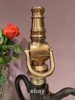 Antique 2 1/2 in. Leather wrapped fire nozzle play pipe with leather handles