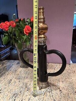 Antique 2 1/2 in. Leather wrapped fire nozzle play pipe with leather handles
