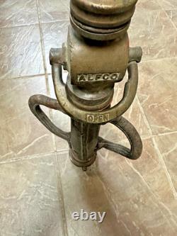 Antique ALFC Brass Fire Hose Nozzle withLeather Wrapped Handles 23 Long