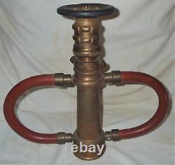 Antique Elkhart Brass Fireman Hose Nozzle Doorstop Art Fire Man Tool Lamp Statue