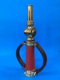 Antique Elkhart brass 2 1/2 In. Fire Nozzle dated Aug7,1917 With Red Cord Wrap