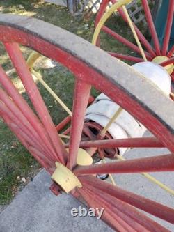 Antique Hand Drawn Fire Hose Transporter with Hose and nozzle