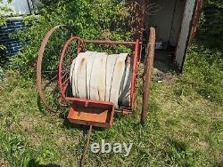 Antique fire hose cart