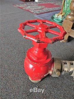 Fire Hose In Wall Mounted Cradel With Fire Nozzle & Hand Operated Tap C 1950's