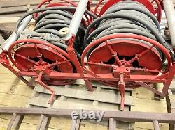 Hose reels with hose and guns(nozzles) off 1947 fire truck Dual reels