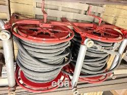 Hose reels with hose and guns(nozzles) off 1947 fire truck Dual reels