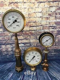Lot of 3 vintage brass pressure gauges Mounted On (2) Vintage Fire nozzles