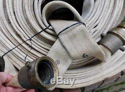 Old Vintage Antique Fire Hose with Nozzle Firefighter