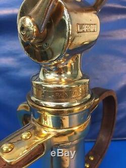 Vintage 21/2 In. Larkin 18in. Leather Handle Polished Brass Fire Nozzle