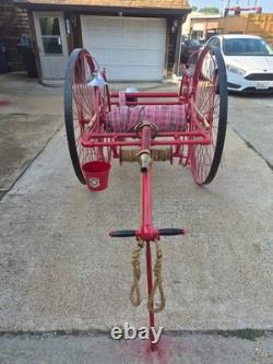 Vintage Fire Hose Reel Cart with Underwriters Nozzle, Axe, And Fire Hydrant