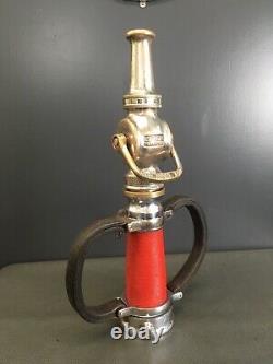 Vintg. 1927 Larkin nickel & Chrome Over-brass leather hds. &red cord fire nozzle