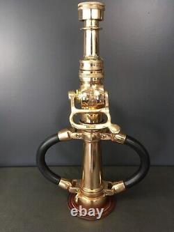Vintg. Akron brass play pipe With blk. Rubber hds. / Akron shut off & fire noz. Tip