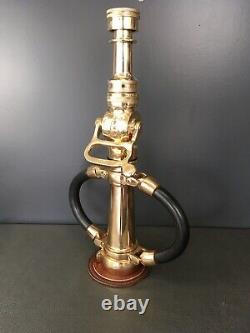 Vintg. Akron brass play pipe With blk. Rubber hds. / Akron shut off & fire noz. Tip