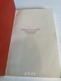 Ancien catalogue de matériel de lutte contre l'incendie Eureka, avec des insignes de pompier et des buses.