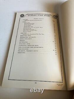 Ancien catalogue de matériel de lutte contre l'incendie Eureka, avec des insignes de pompier et des buses.
