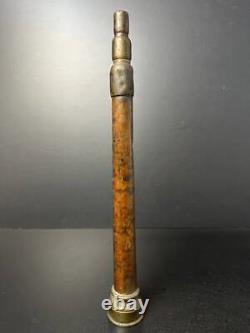 Buse d'incendie ancienne en cuivre avec tuyau, fabriquée au Japon.